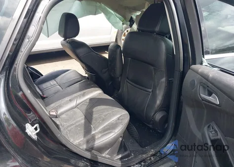 2014 Ford Focus Titanium from USA, damaged, VIN 1FADP3J27EL234873